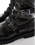 Canada flat chunky buckle knee boots in black