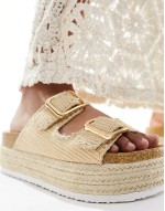 Traffic double buckle flatform mules in natural