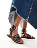 Fiji leather studded flat sandals in black