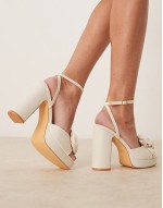 platform heeled sandals with flower in linen